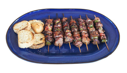 greek kebabs on a platter