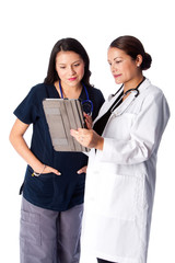 Doctor and Nurse discussing Patient medical chart