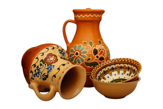 Traditional Colored Pottery. Painted Ceramic Crockery.