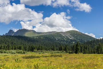 Landscape mountains with blue sky at autumn sunny day