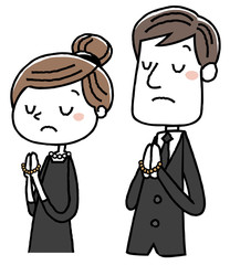 喪服を着た男女：合掌
