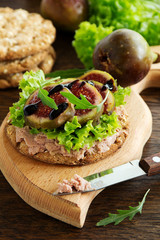 Diet bread with pate and fresh figs.