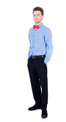 Smiling businessman in a bow tie looking up. top view. Isolated on white background. Proud businessman standing with his hands in his pockets.