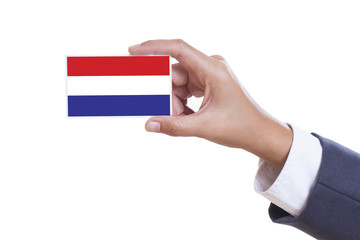 Businessman holding a business card with Dutch Flag 