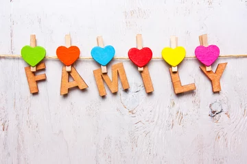 Foto op Plexiglas the word "family" of the wooden letters © alexmia