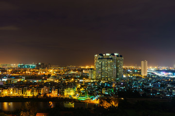 Panoramic view of Ho Chi Minh city by night, Vietnam. Ho Chi Minh city (aka Saigon) is the largest city and economic center in Vietnam with population around 10 million people.