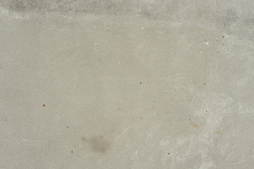 Wall fragment with scratches and cracks