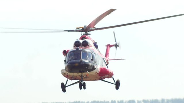 Modern emergency medicine helicopter take off at airfield