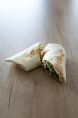 Tortilla wrap on wooden table