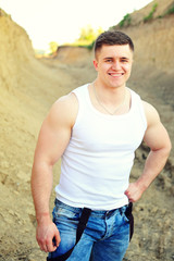 Hiking - Hiker enjoying view. Male hiker sitting and relaxing.