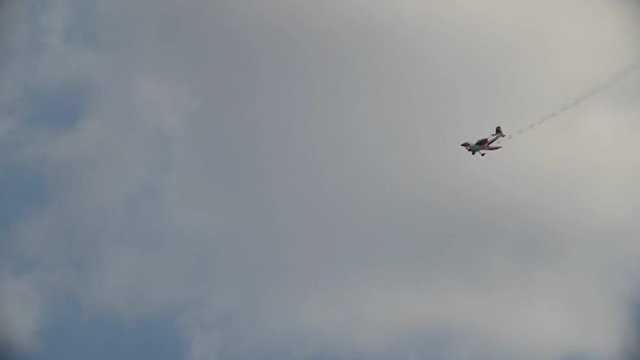 Soviet russia plane flying and performs aerobatics at airshow