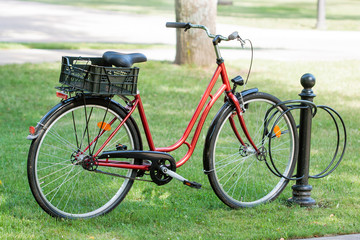 Fototapeta premium Red bicycle parked