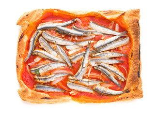 overhead shoot sardines with tomato baked in puff pastry base