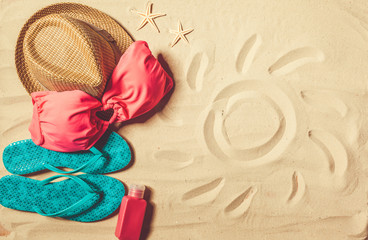 Holiday accessories on sand beach