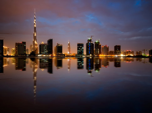 Fascinating reflection of tallest skyscrapers in Business Bay, Dubai, United Arab Emirates