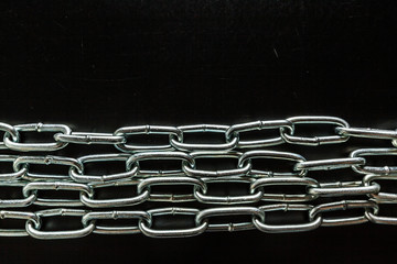 Fototapeta premium Strong chain black background