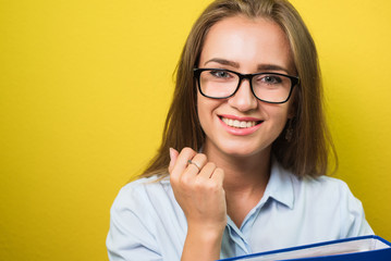 Obraz premium Cute young business woman with glasses