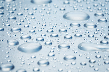 drops of water on a light surface
