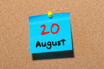 August 20th. Day 20 of month, color sticker calendar on notice board. Summer time. Empty space for text