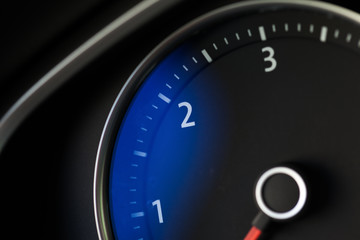 Close up shot of a speedometer in a car