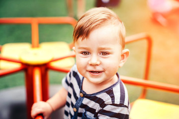 Little baby playing outdoor in the park