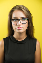 Fototapeta premium Cute young business woman with spectacles