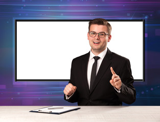Television program host with big copy screen in his back