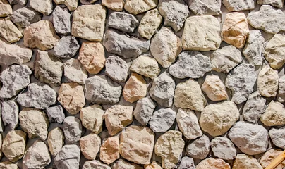 Wall murals Stones Rock stone wall texture background