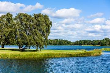 View over the central part of the Swedish coastal city Kalmar looking north over the Fredriksskans canal. Water and nature is integrated as an important part of the city. Not a house in view. © imfotograf
