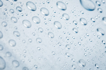 drops of water on a light surface