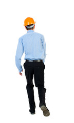 Back view of running engineer in helmet. Walking guy in motion. Rear view people collection. Backside view of person. Isolated over white background. Businessman in a blue shirt and a helmet runs into