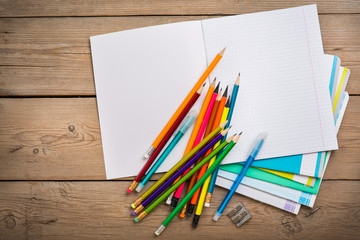Obraz premium notebooks for schoolon the wooden table
