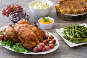 Thanksgiving dinner on rustic wooden background

