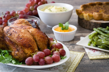 Thanksgiving dinner on rustic wooden background

