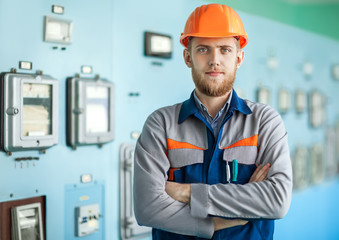 young engineer at control room in factory