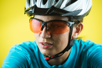 Close-up portrait of female cyclist