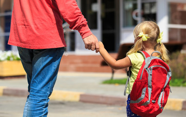 father walking little daughter to school or daycare - obrazy, fototapety, plakaty