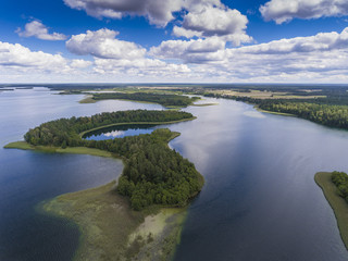 View of small islands on the lake in Masuria and Podlasie distri - obrazy, fototapety, plakaty