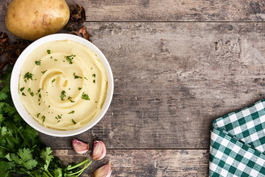 Mashed potato on wooden background

