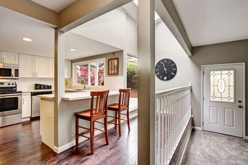 Open floor plan. White kitchen room interior.