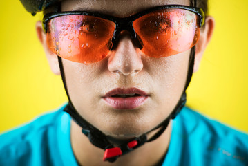 Fototapeta premium Close-up portrait of female cyclist