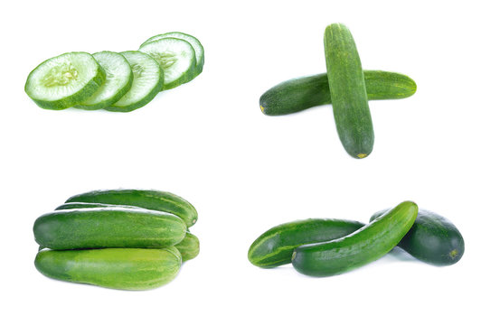 Pile of fresh cucumbers isolated on white background.