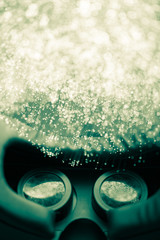 Black VR headset and Fiber optics background