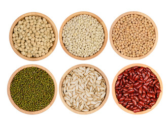 set of garins in wooden bowl on white background-top view