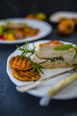 Roast turkey with herbs and grilled sweet potatoes 