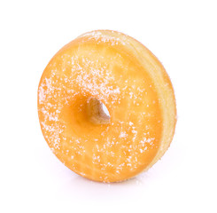 sugared donuts over white background