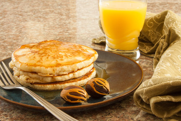 Pancakes - Homemade Pancakes Nutmeg Flavored and Served With Freshly Squeezed Orange Juice