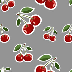 Pattern of red big cherry stickers different sizes with leaves on gray background