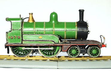 Fototapeta na wymiar Steam locomotive antique toy model