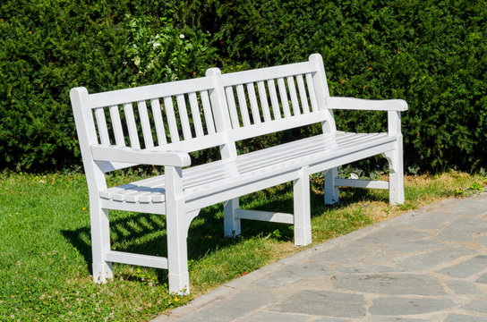 Beautiful white vintige bank in park